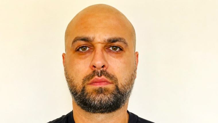 Romanian National dragged to court in Tanzania for siphoning money from banks via digital fraud
